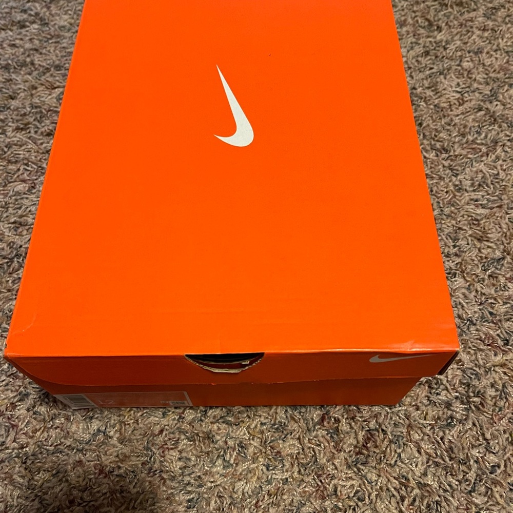 Black and white cleats never worn